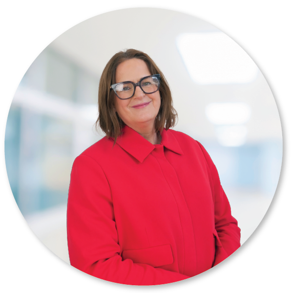 Portrait of our Director General for Communities, Miriam Craven, smiling.