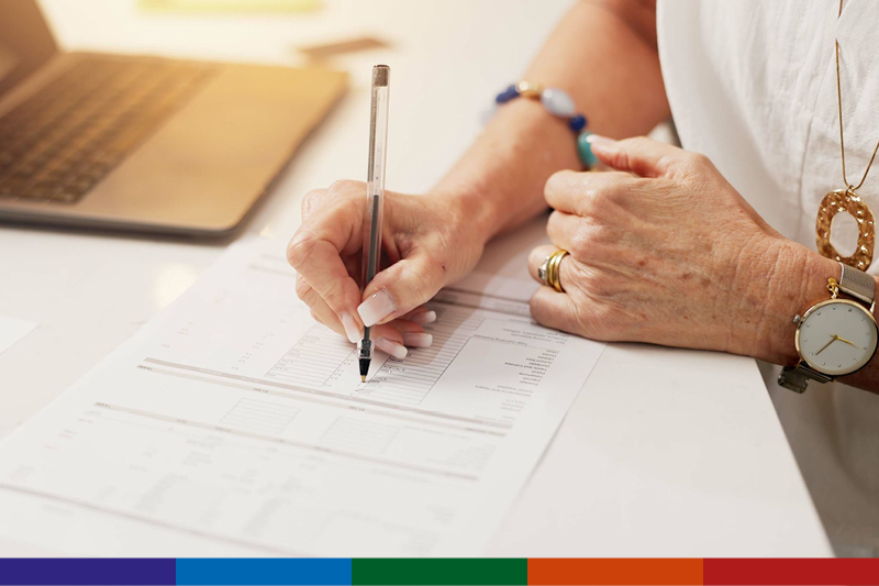 Image of person filling out a survey